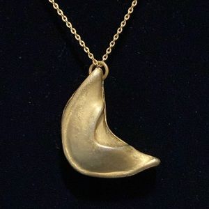 Fortune cookie necklace in gold-tone.